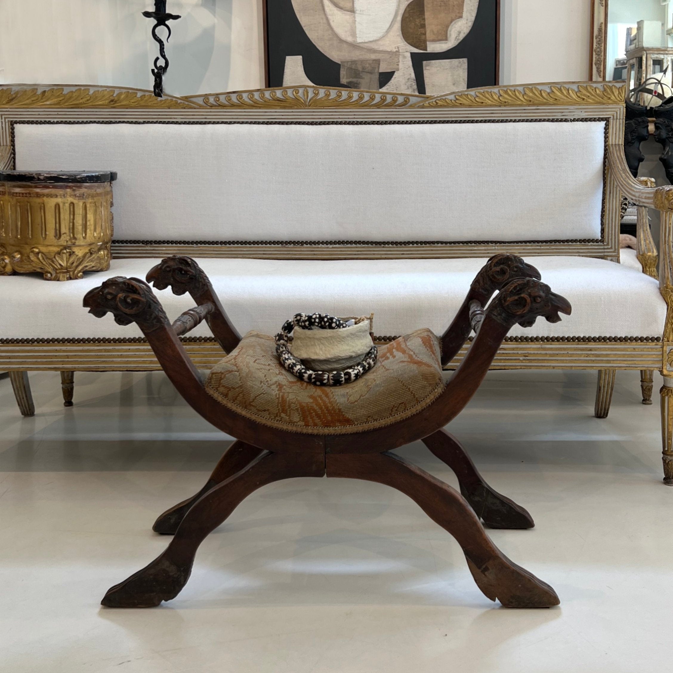 19th Century Italian Walnut Curule Stool with Ram's Head Carving