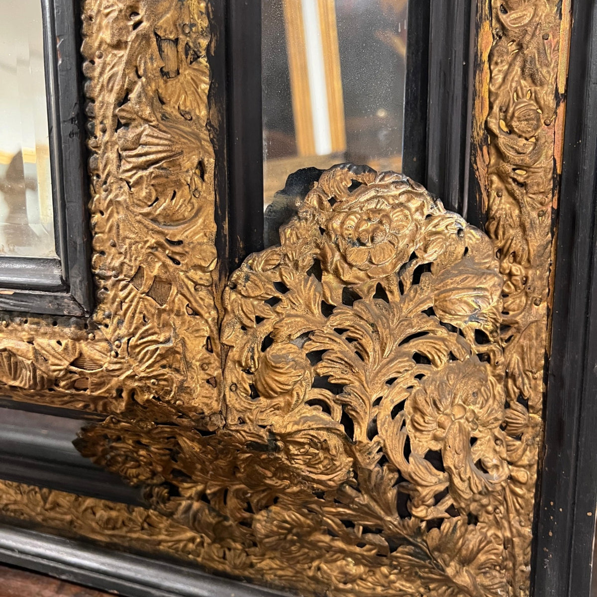 18th Century Belgian Mirror with Ebonized Wood & Embossed Copper