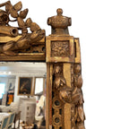 19th Century French Louis XVI Mirror with Urn Carving