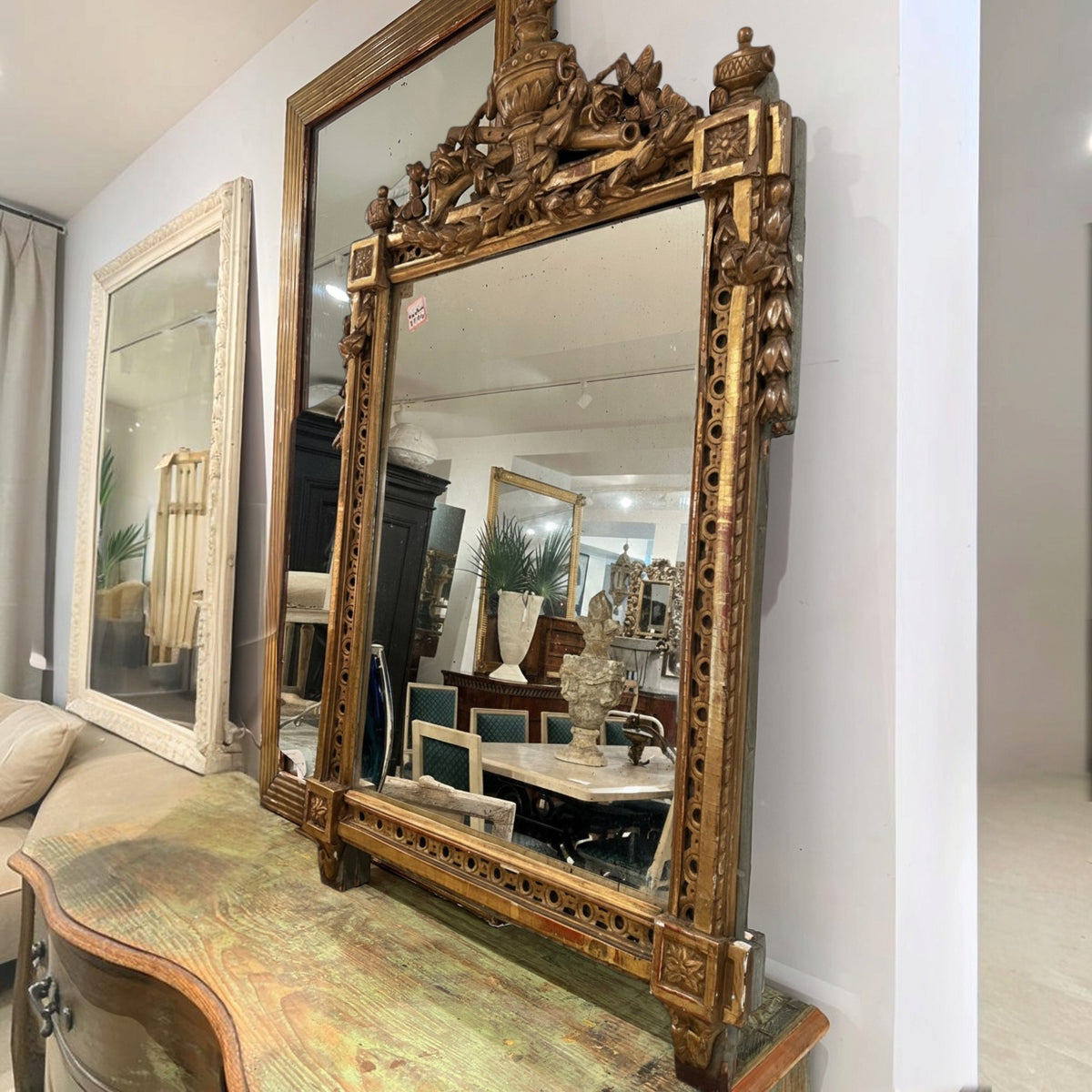 19th Century French Louis XVI Mirror with Urn Carving