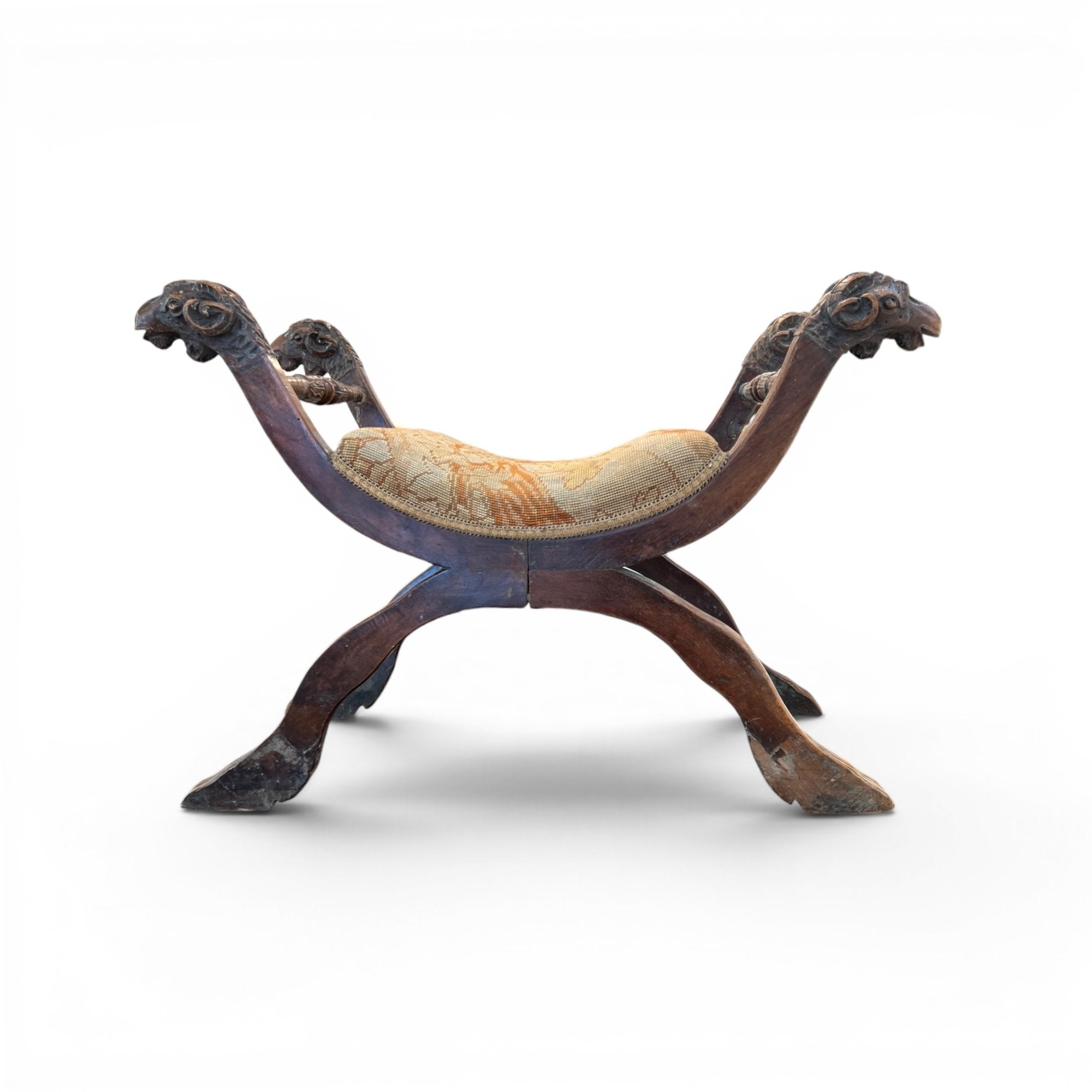 19th Century Italian Walnut Curule Stool with Ram's Head Carving