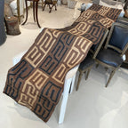 Tara Shaw African Kuba cloth long runner featuring handwoven geometric patterns in earthy brown and black tones.