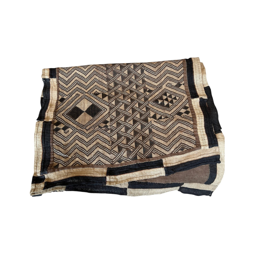 Tara Shaw authentic African Kuba cloth runner featuring intricate handwoven geometric patterns in earthy brown and black