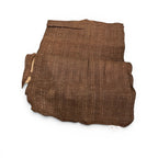 Tara Shaw African Kuba cloth long runner in dark brown with handwoven geometric stitching and textured fabric.