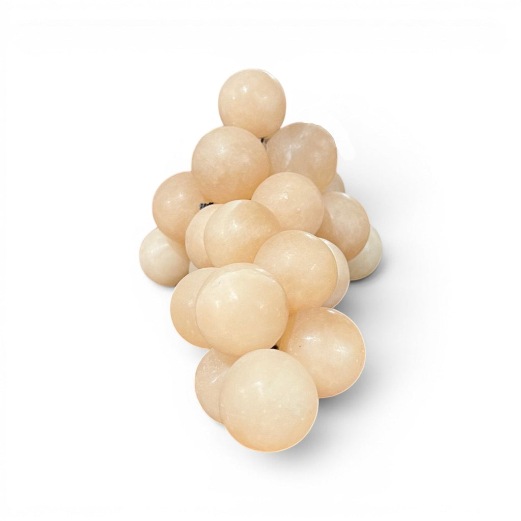 Tara Shaw medium alabaster grapes decorative sculpture with translucent cream stone spheres in an organic cluster.