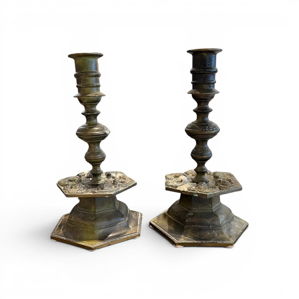 Tara Shaw pair of 19th century Belgian bronze candlesticks with a rich aged patina and ornate hexagonal bases.