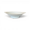Tara Shaw 19th century European ironstone bowl with a classic pedestal base and elegant aged patina.
