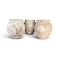 Tara Shaw set of three rustic 18th century Spanish pottery jars with a weathered, textured patina.