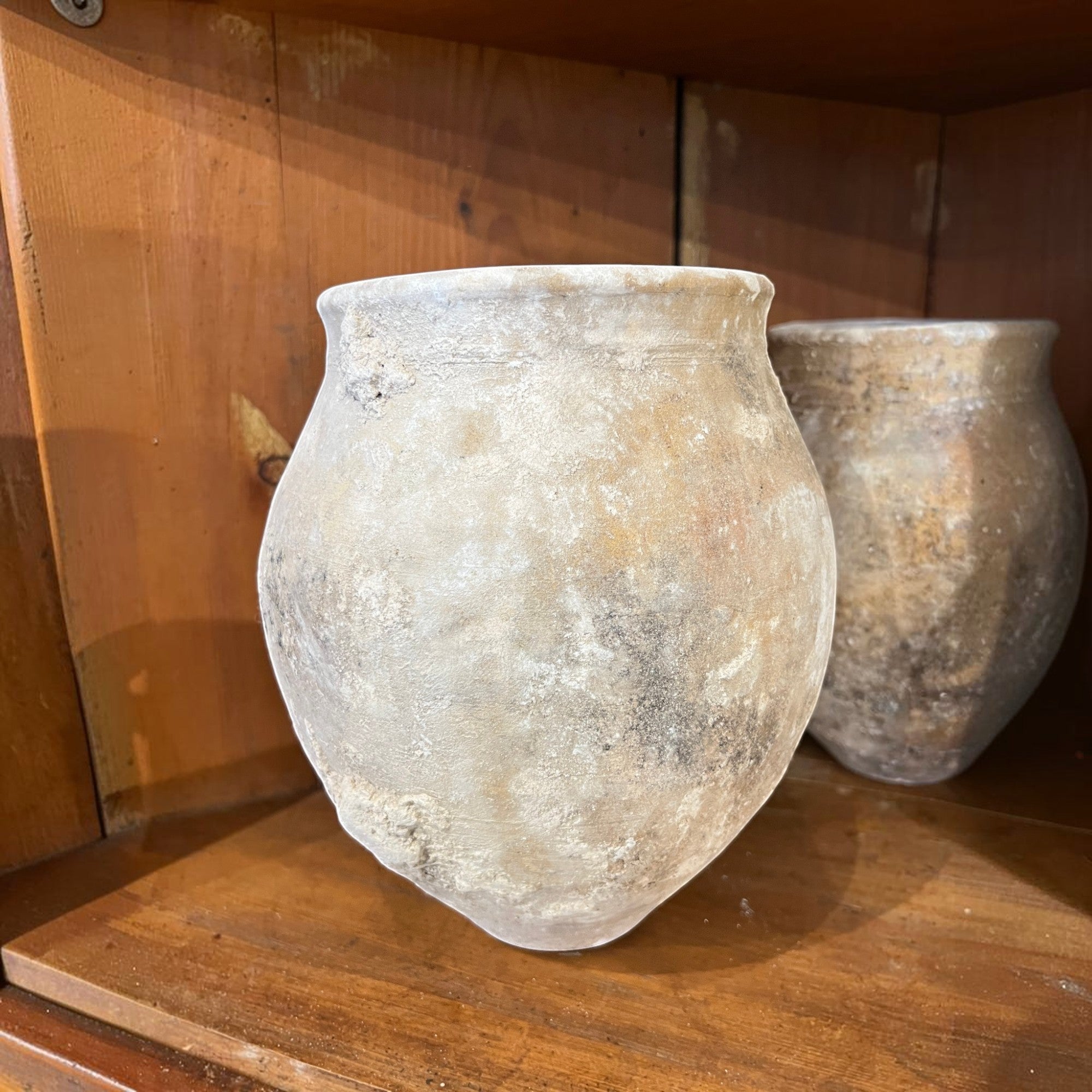 Tara Shaw set of three rustic 18th century Spanish pottery jars with weathered patina and unique handcrafted texture.
