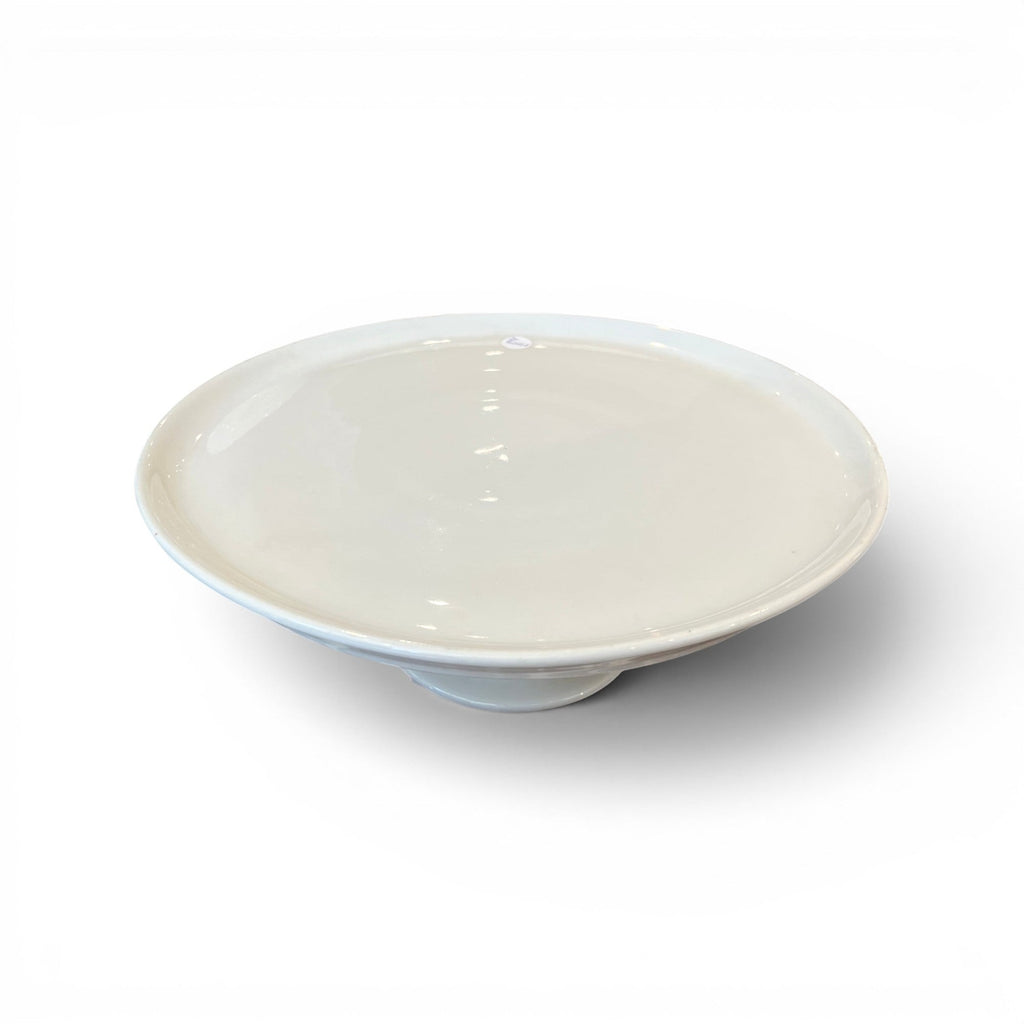 Tara Shaw antique 19th century European white ironstone cake plate with a classic pedestal base and aged patina.