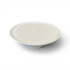 Tara Shaw antique 19th century European white ironstone cake plate with a classic pedestal base and aged patina.