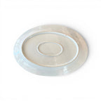 Tara Shaw 19th century antique white ironstone platter showing the underside with aged glaze and patina
