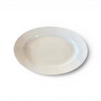 Tara Shaw antique white ironstone oval platter with a softly aged glaze and rich patina from the 19th century.