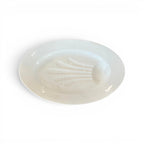 Tara Shaw antique 19th century white ironstone platter with a decorative shell-like well and aged patina.