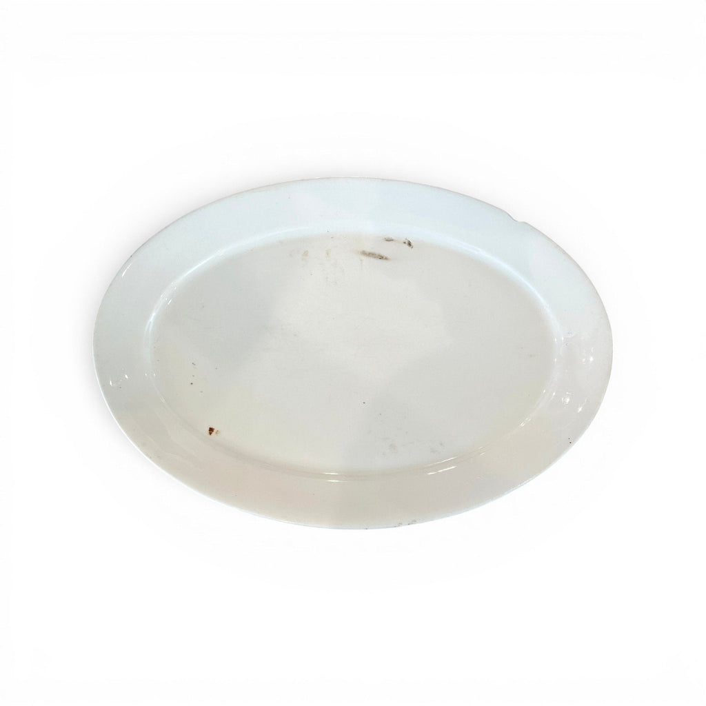 Tara Shaw antique 19th century European white ironstone oval platter with aged patina and subtle surface character.