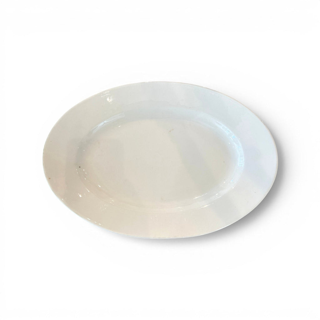 Tara Shaw antique 19th century European white ironstone oval platter with aged glaze and subtle patina