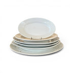Tara Shaw collection of five assorted 19th century European antique white ironstone platters with aged patina
