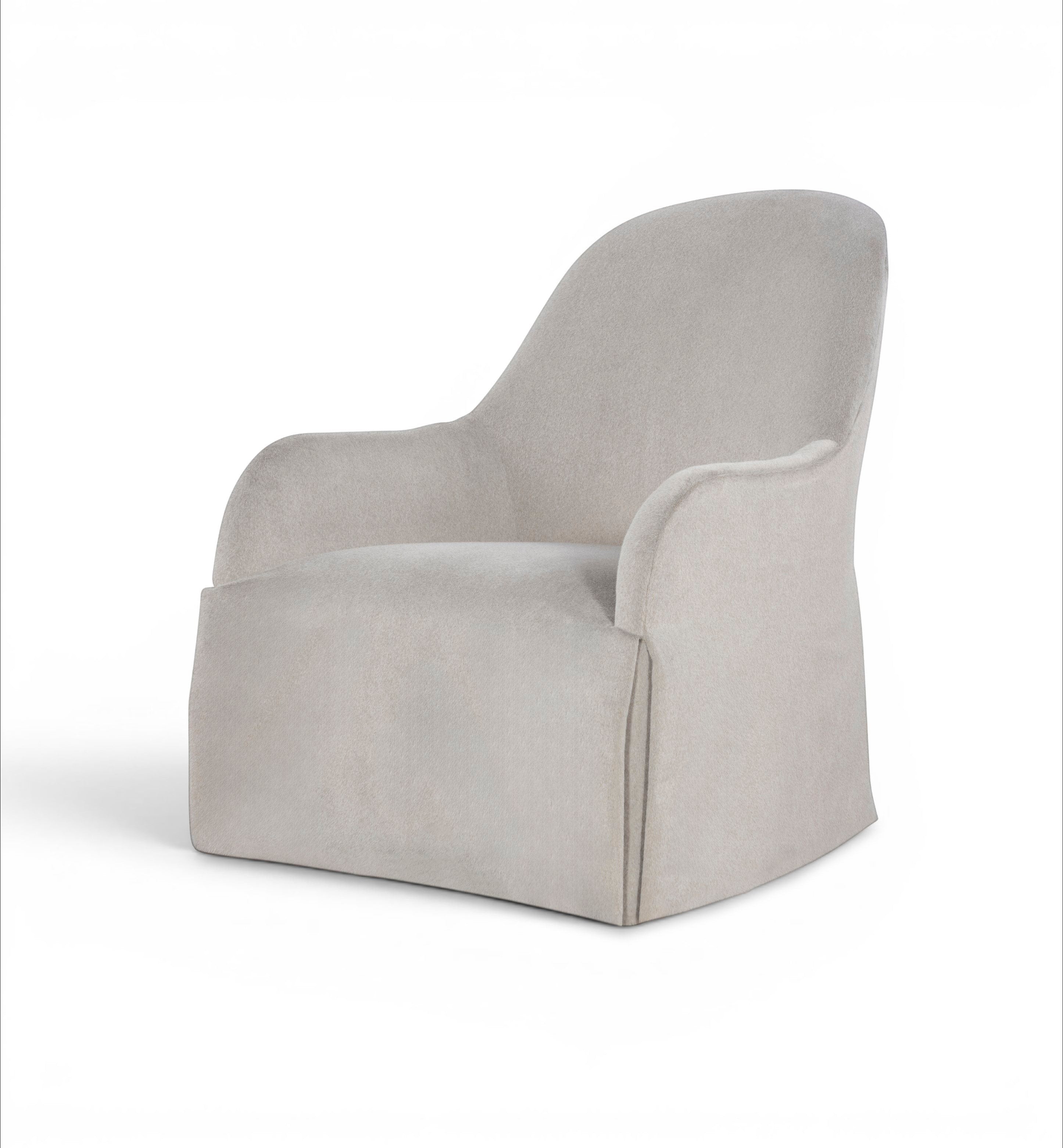 Tara Shaw x Century - Auguste skirted swivel lounge chair in a neutral light grey fabric with a curved back and elegant silhouette