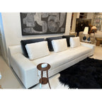 Tara Shaw Christian Liaigre Augustin sofa in oyster Belgium linen with charcoal mohair back pillows in a showroom