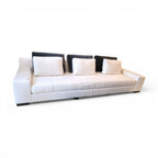 Tara Shaw Christian Liaigre Augustin sofa in oyster Belgium linen with contrasting charcoal mohair back pillows.