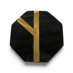 Tara Shaw black octagonal coaster with elegant gold inlay detail for modern home decor