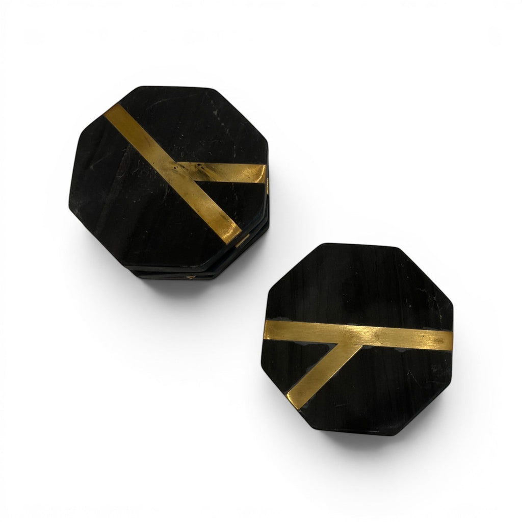 Tara Shaw black octagonal coasters with gold inlay detail, set of four for modern home decor.