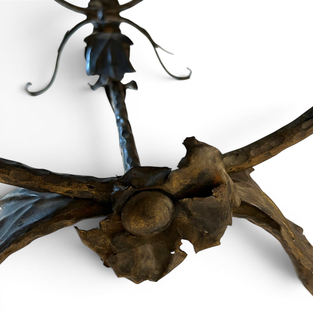 Tara Shaw bronze coffee table base featuring intricate sculptural leaf detailing and a textured metal finish.