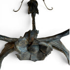 Tara Shaw bronze coffee table base featuring intricate sculptural leaf detailing and a dark metallic finish.