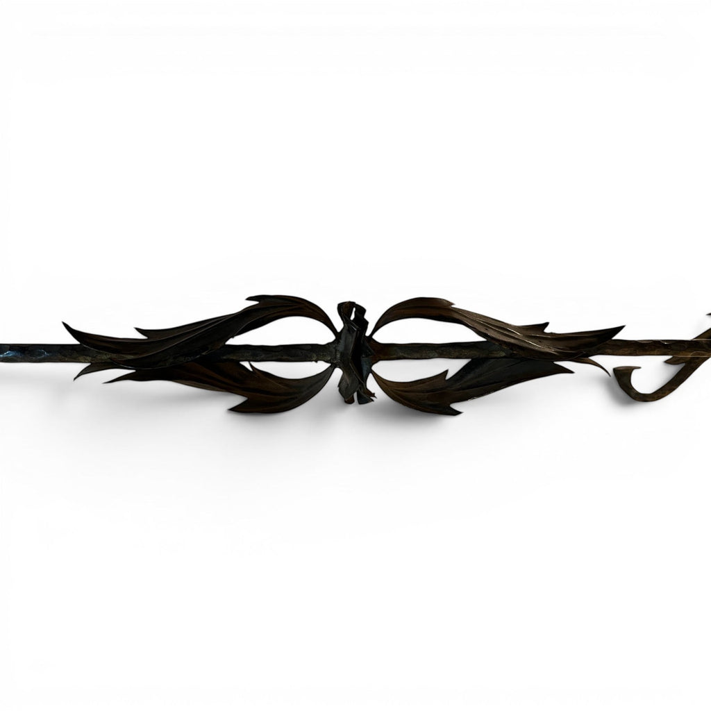 Tara Shaw bronze leaf table base with intricate sculptural metal detailing in a dark finish