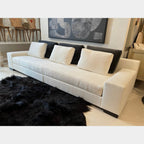 Tara Shaw Christian Liaigre Augustin sofa in oyster Belgium linen with contrasting charcoal mohair back pillows