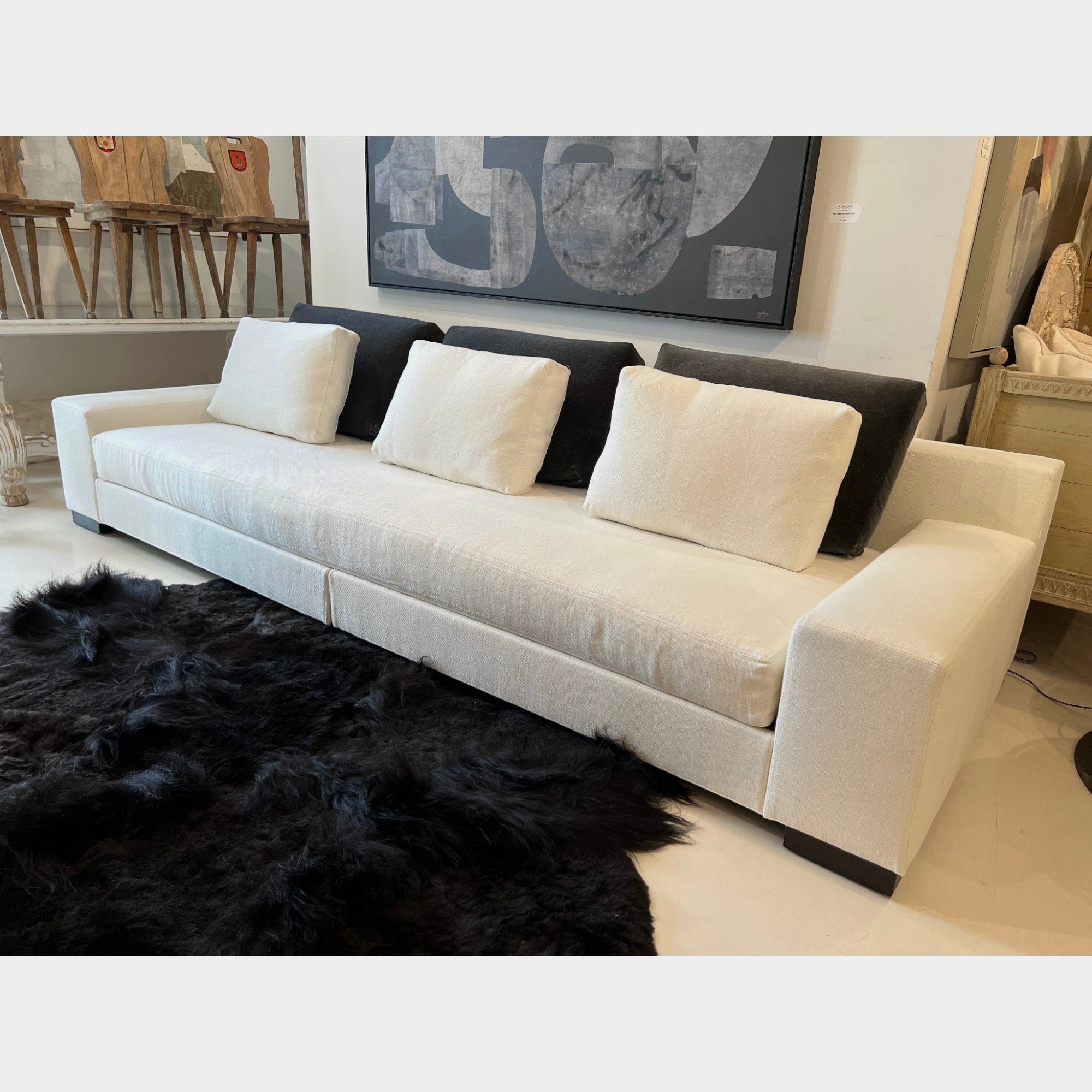 Tara Shaw Christian Liaigre Augustin sofa in oyster Belgium linen with contrasting charcoal mohair back pillows