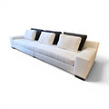 Tara Shaw Christian Liaigre Augustin sofa in oyster Belgium linen with contrasting charcoal mohair back pillows.