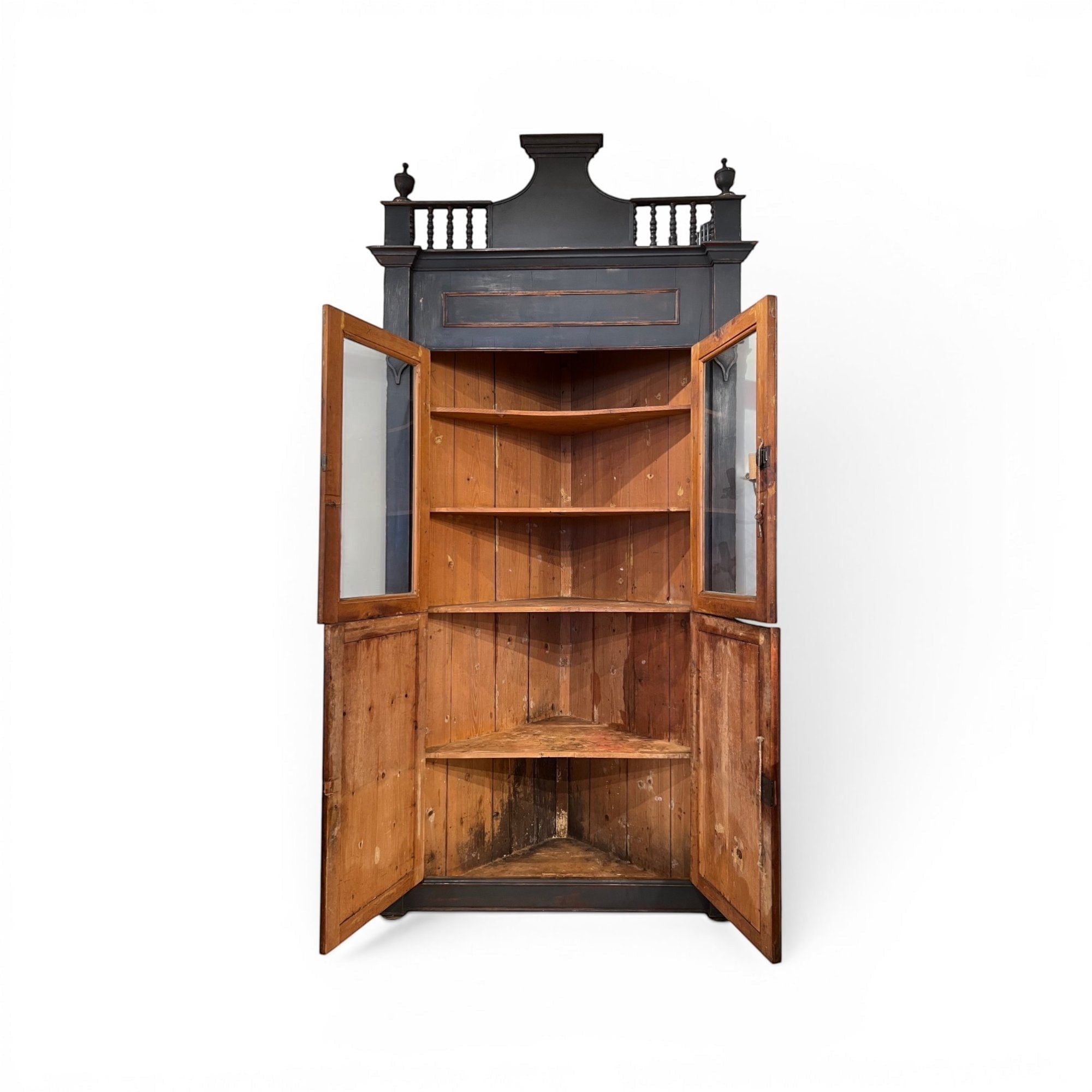 Tara Shaw 18th-century Italian ebonized corner cabinet with open glass doors and natural wood interior shelving.