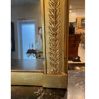 Tara Shaw 19th-century French Empire mirror with a richly gilded frame featuring classic laurel leaf carvings.
