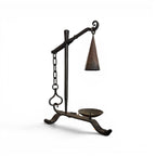 Tara Shaw 19th-century French iron candleholder with a rustic aged patina and adjustable hanging snuffer.