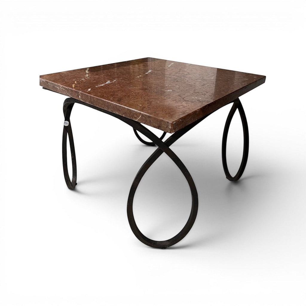 Tara Shaw early 20th-century French coffee table with a square brown marble top and sculptural curly metal base.