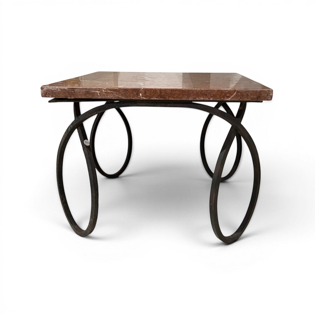 Tara Shaw early 20th-century French coffee table with a red veined marble top and sculptural curly metal base.