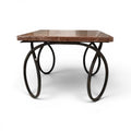 Tara Shaw early 20th-century French coffee table with a red veined marble top and sculptural curly metal base.