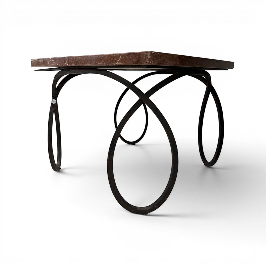 Tara Shaw early 20th-century French coffee table with a brown veined marble top and a sculptural black curly metal base.