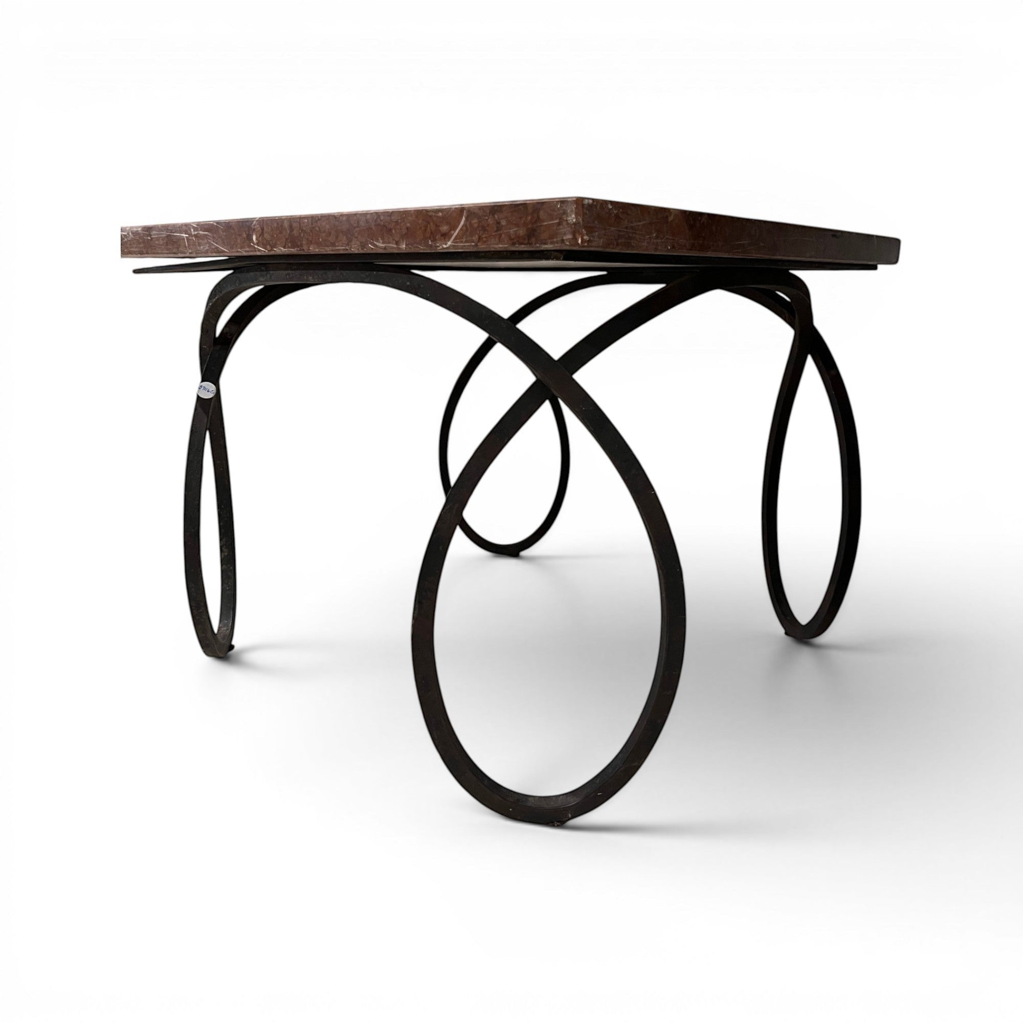 Tara Shaw early 20th-century French coffee table with a brown veined marble top and a sculptural black curly metal base.