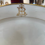 Tara Shaw French china plate featuring an elegant gold monogrammed letter B and a delicate gold rim.