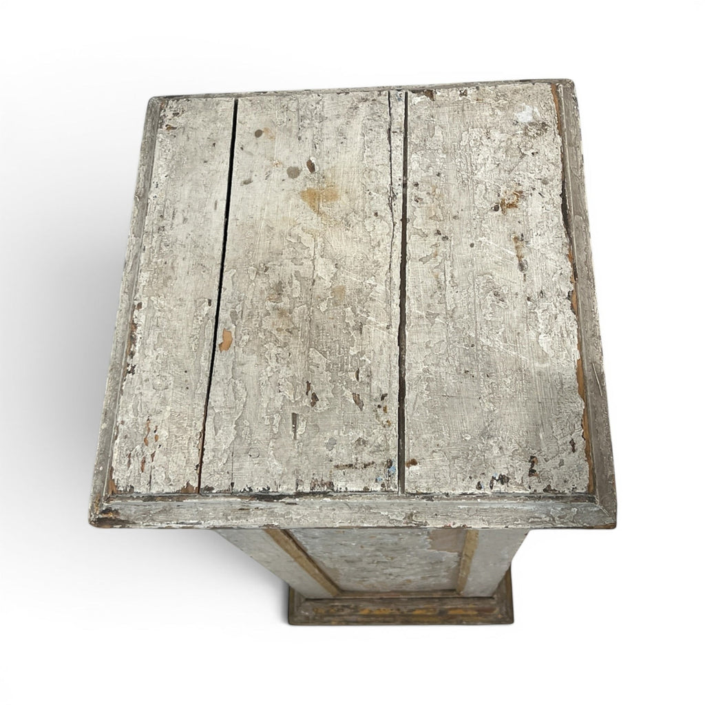 Tara Shaw 19th century French wooden pedestal with a distressed white painted finish and aged patina, top view.