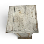 Tara Shaw 19th century French wooden pedestal with a distressed white painted finish and aged patina, top view.