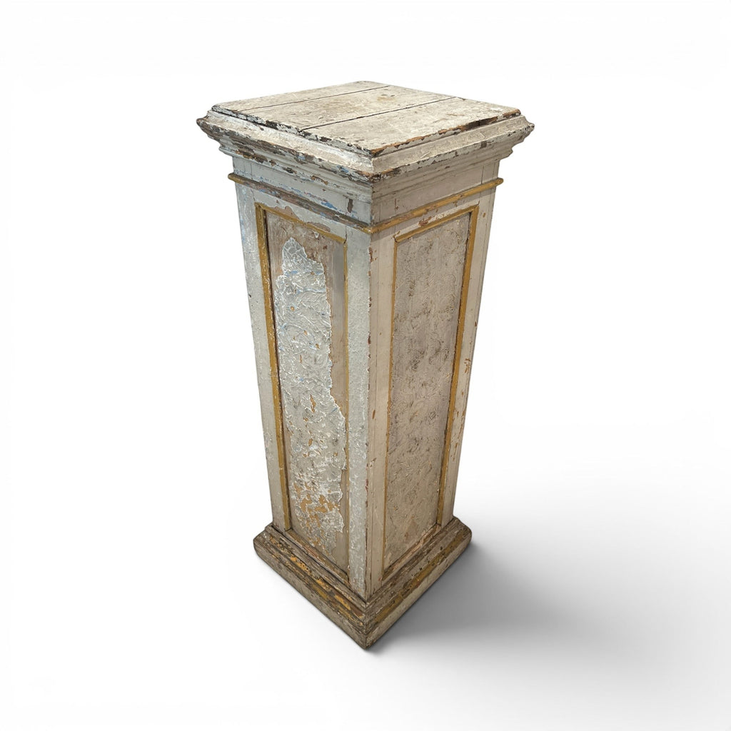 Tara Shaw 19th century French wooden pedestal with a distressed white painted finish and gold trim accents.