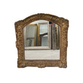 Tara Shaw 19th century French Regence mirror with intricate gold carved wood frame and elegant arched top.