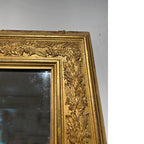 Tara Shaw 19th century French Restauration period mirror with ornate gilded wood frame and aged leaf carvings