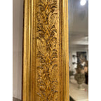 Tara Shaw 19th century French Restauration period mirror with ornate gold leaf carved frame and aged patina detail