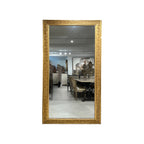 Tara Shaw 19th-century French Restauration period floor mirror with an ornate gold frame and aged finish.