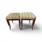 Tara Shaw pair of 19th-century French Directoire walnut stools with green striped upholstery and tapered legs.