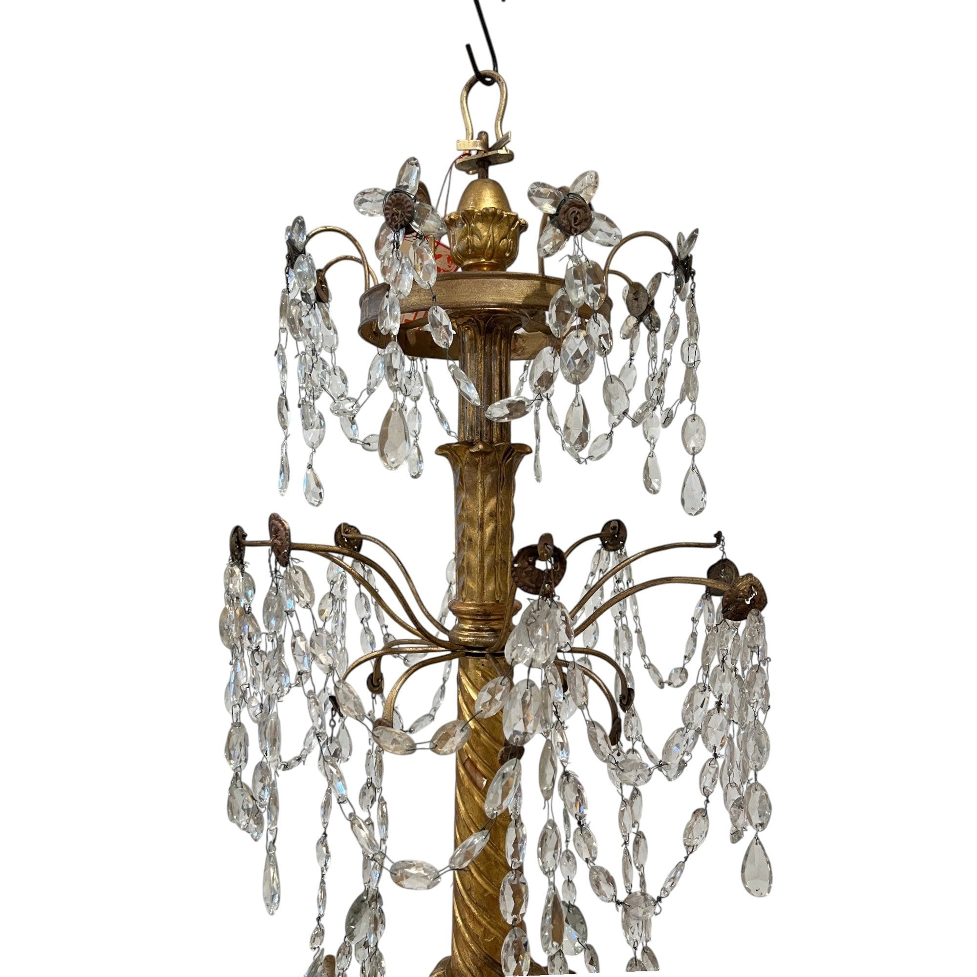 Tara Shaw 18th century Genoese chandelier with aged gold patina, scrolling arms, and cascading crystal teardrops.